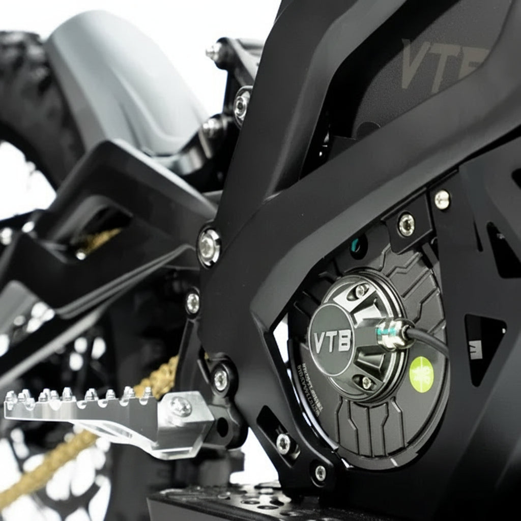 Close-up of a motorcycle chain and sprocket