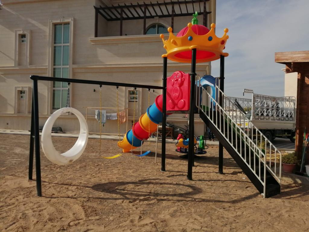 Megastar Castle & Crowns Tube Slide And Moon Swings Outdoor Playground for kids - 825 x 740 x 485 cms