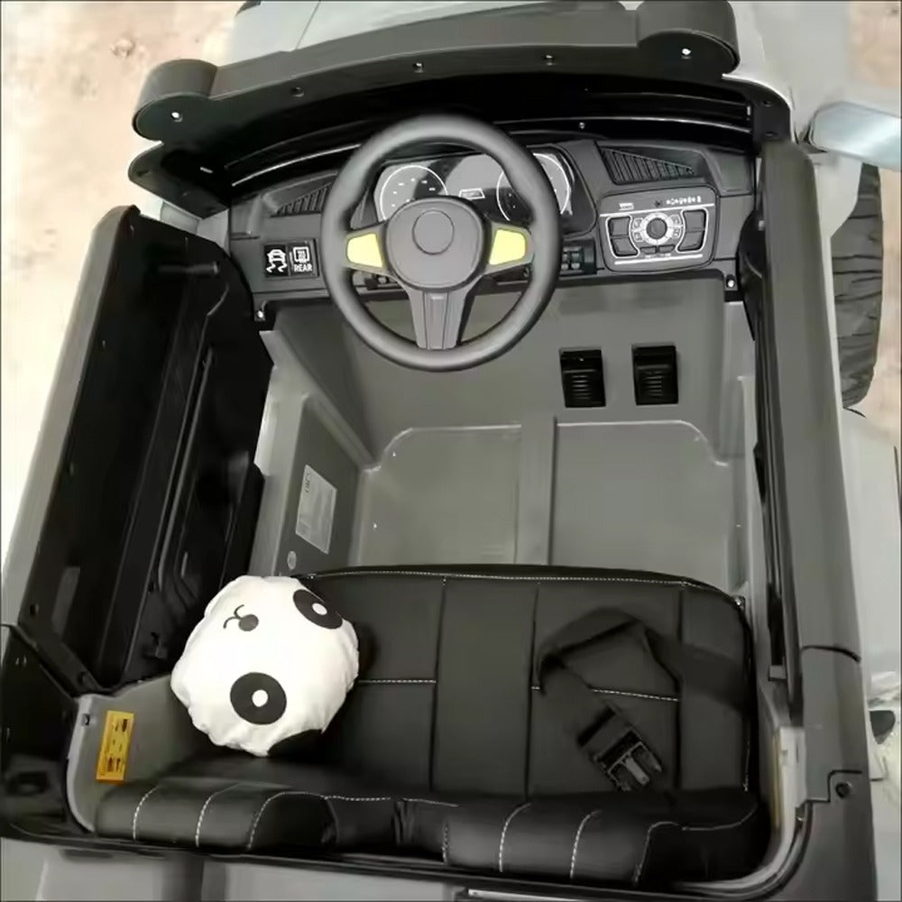 Electric Ride-on Car for Kids with an interior with a steering wheel and dashboard