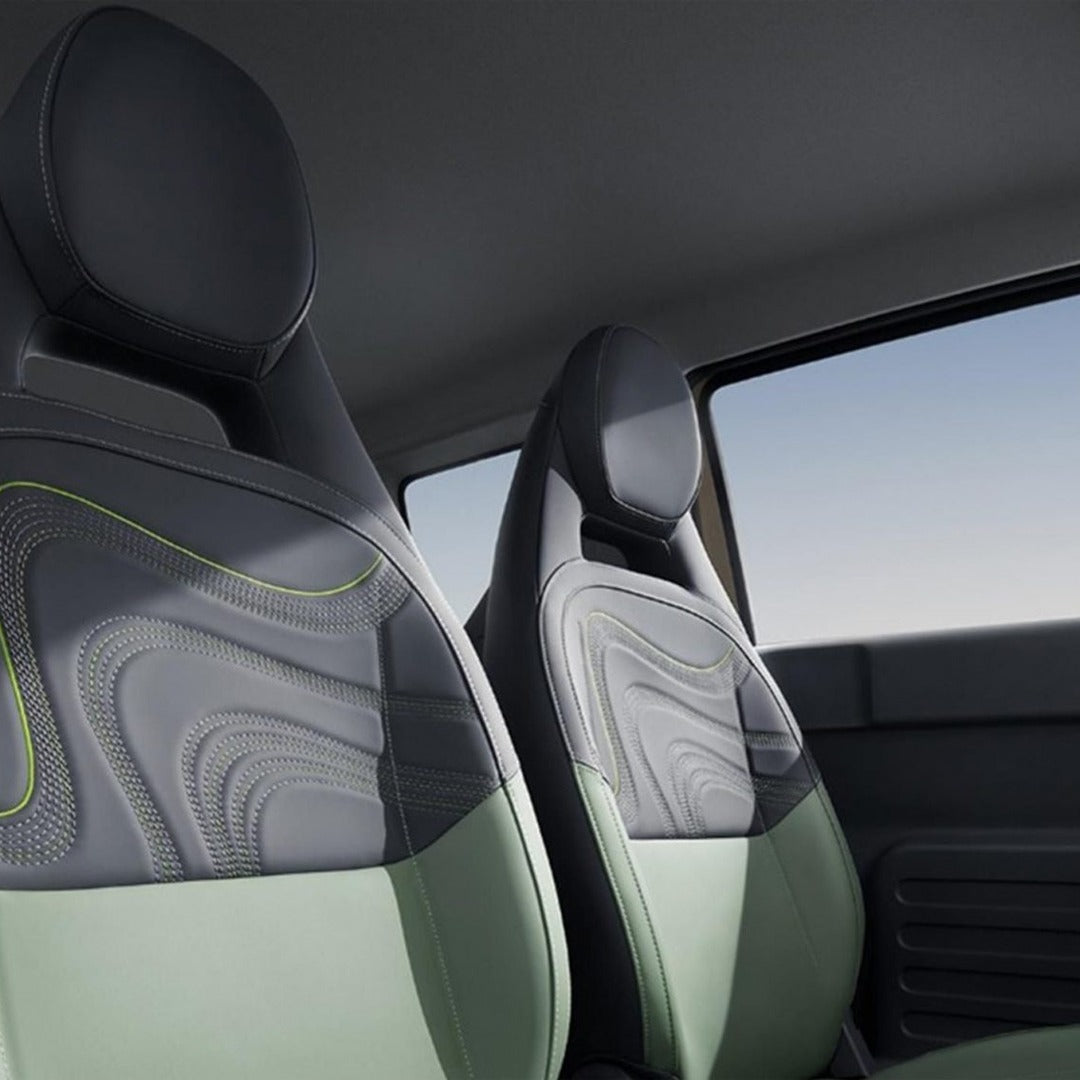 Electric Car interior with grey and black seat covers