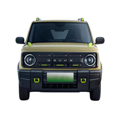 Front view of a beige and black Electric Car Geome SUV