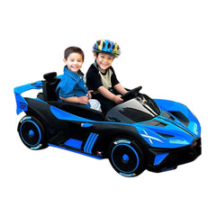 Two children in a blue and black toy car