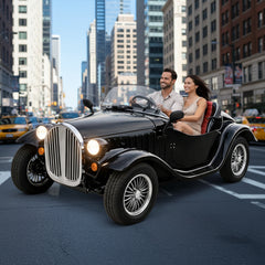 Couple in a black Vintage car on a street