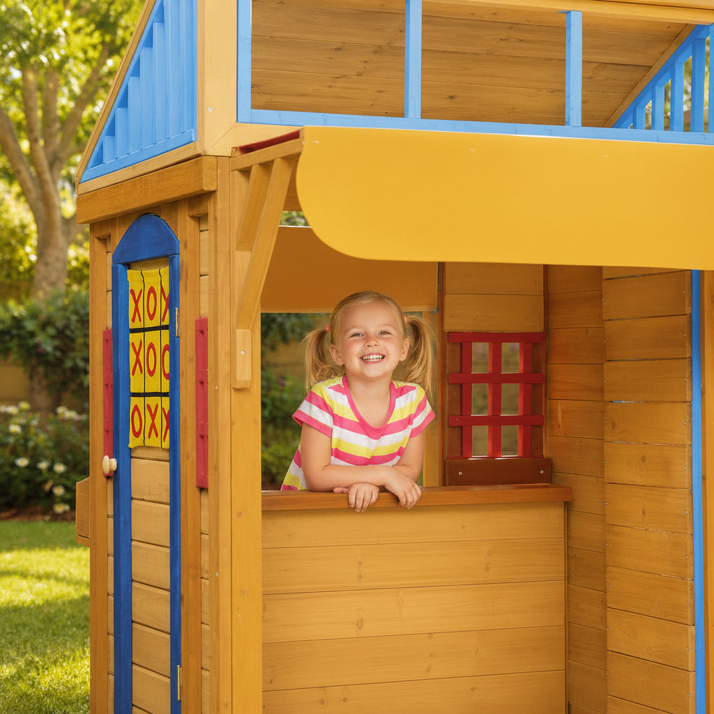 Kid playing in a colorful wooden playhouse 