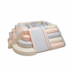 A pastel-colored modular foam play with a ball pit, stairs, and soft blocks for babies and toddlers
