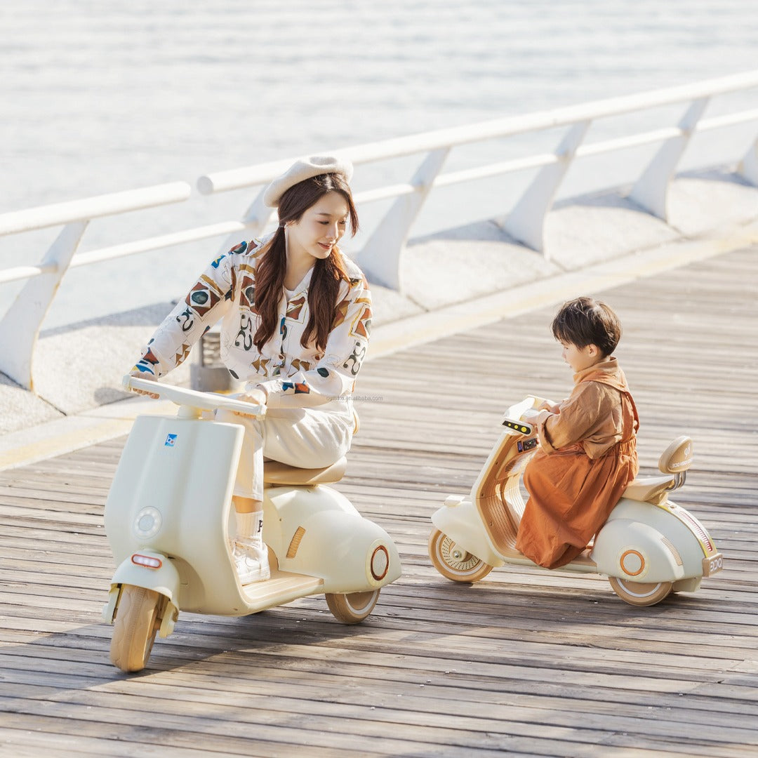 Megastar Ride on 12 v Vespa Scootz Bike for Kids with Parental RC