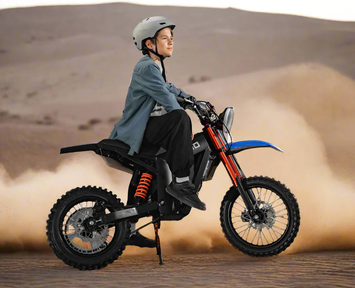 A Person riding a motorcycle in a desert