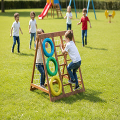 Children playing on a playground with colourful rings in a park.