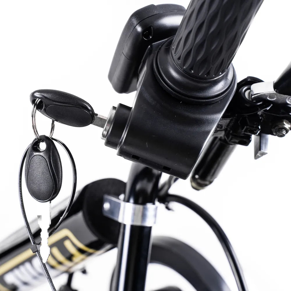 Close-up of a bicycle handlebar with a key holder and bell 
