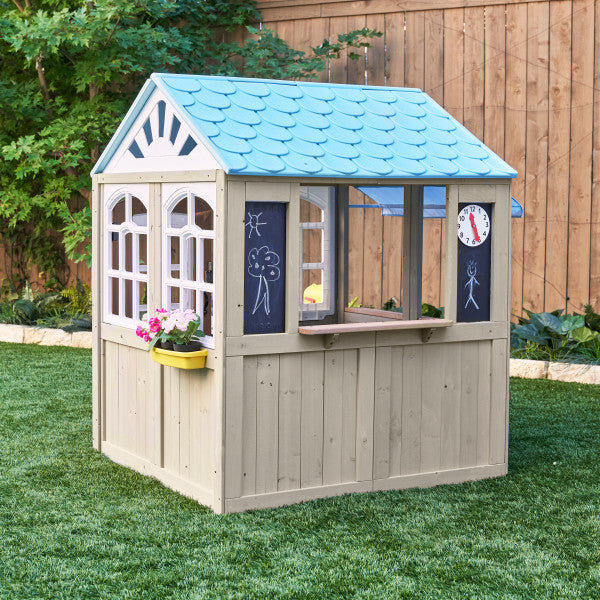 Children's Kidkraft Oceanfront Wooden Outdoor Playhouse with windows and drawing board
