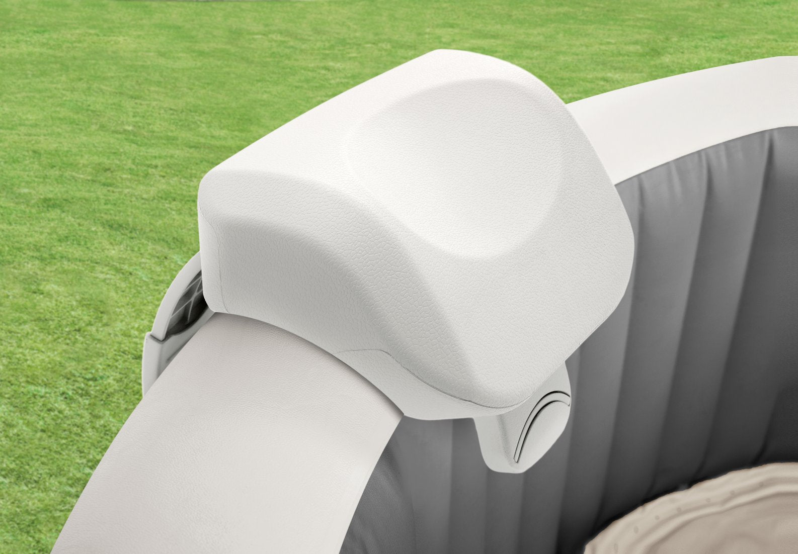 Gray inflatable boat with a white seat cover 