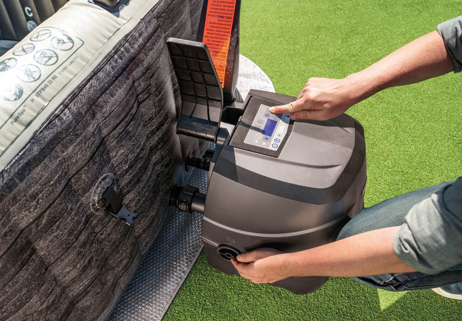 Person using a digital device on a portable power station outdoors