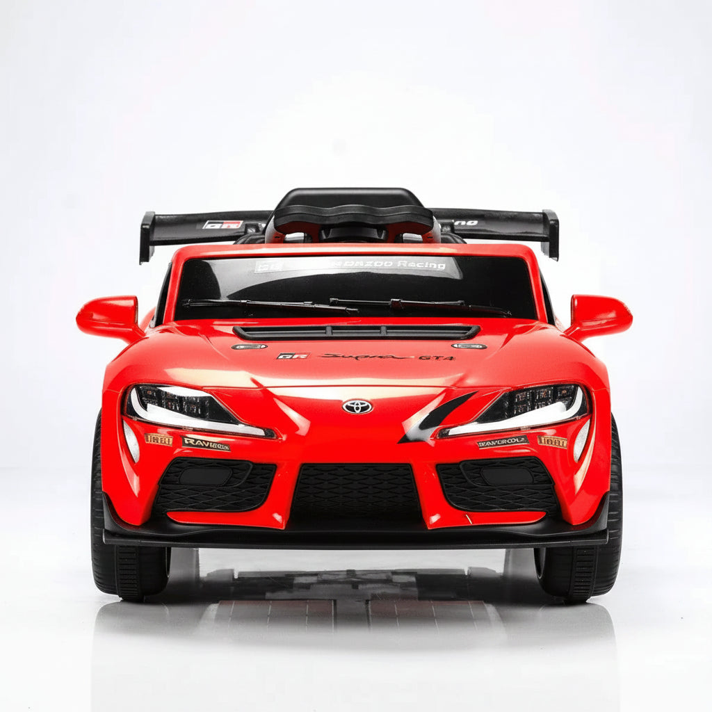Front view of a red Toyota GR Supra GT4 Ride-on Kids Car