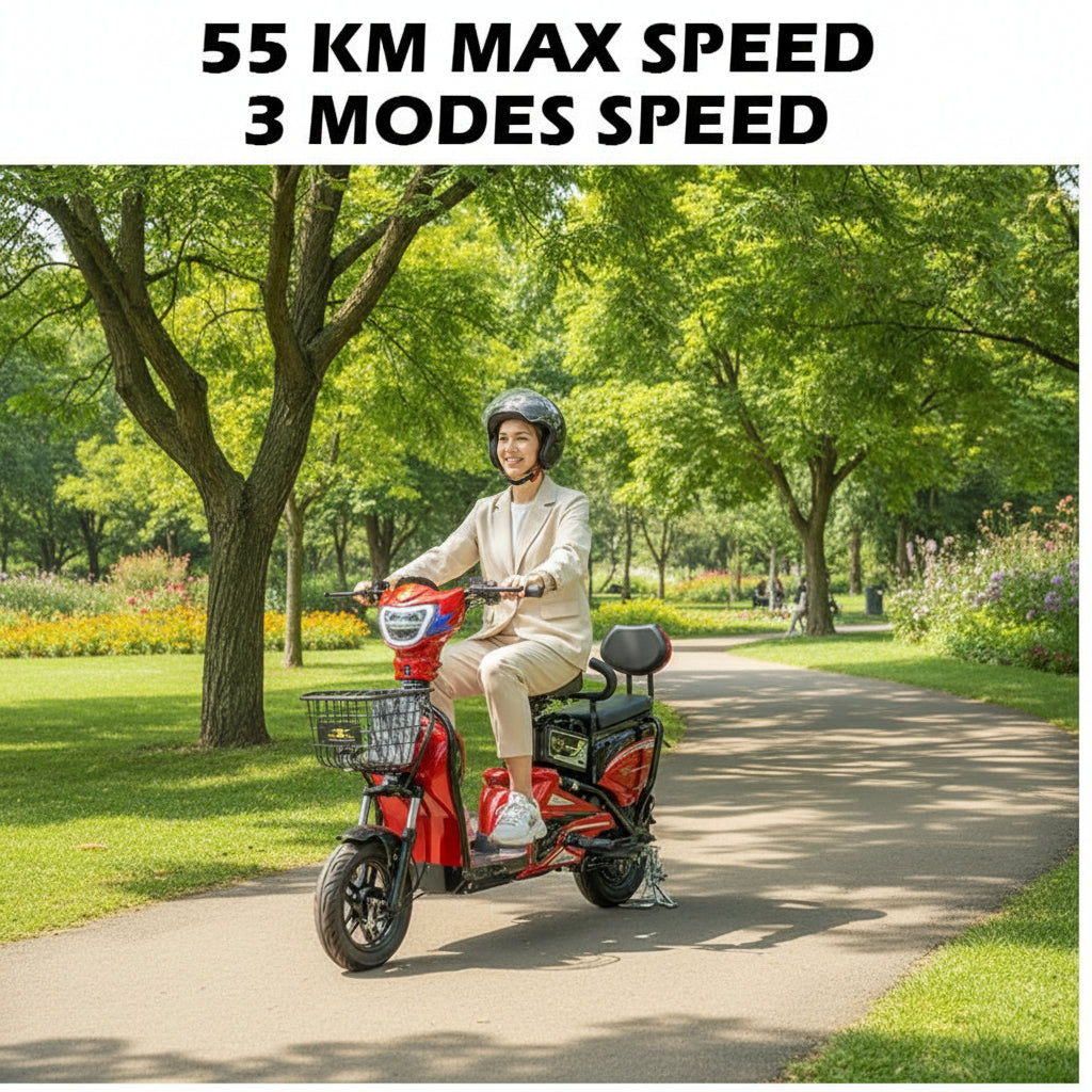 A person rides a red electric scooter with a front basket in the park.