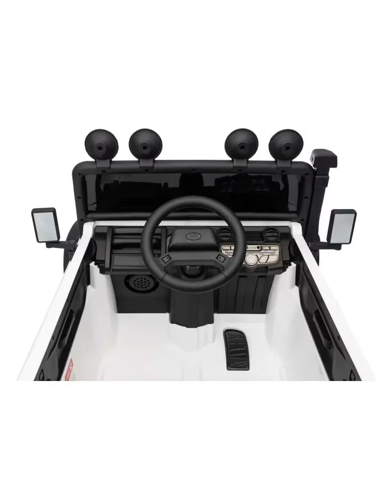 Close-up of a toy car interior with steering wheel and dashboard