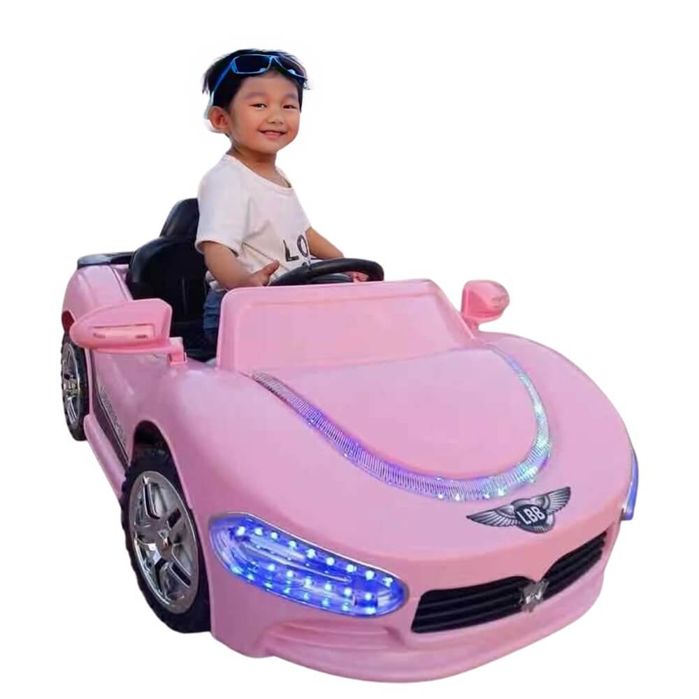 Megastar Ride on 6v Cosmos Swing 'n' Learn Electric Car--pink
