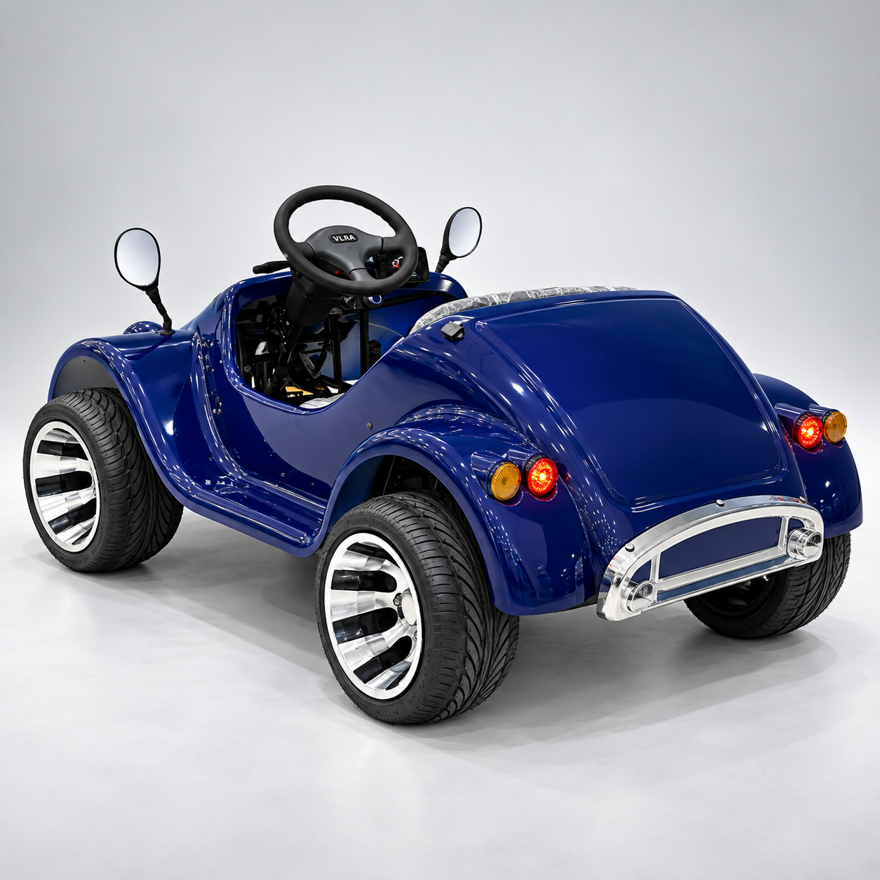 Back view of megawheels Royale Mini Electric Classic Car With wide Seats and alloy rim tyres 48 v battery