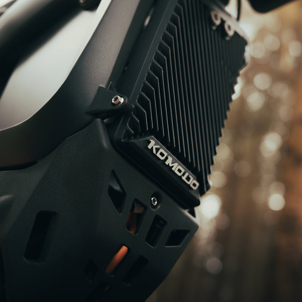 Close-up of a KOMODO Trailer electric dirt bike scooter body component 