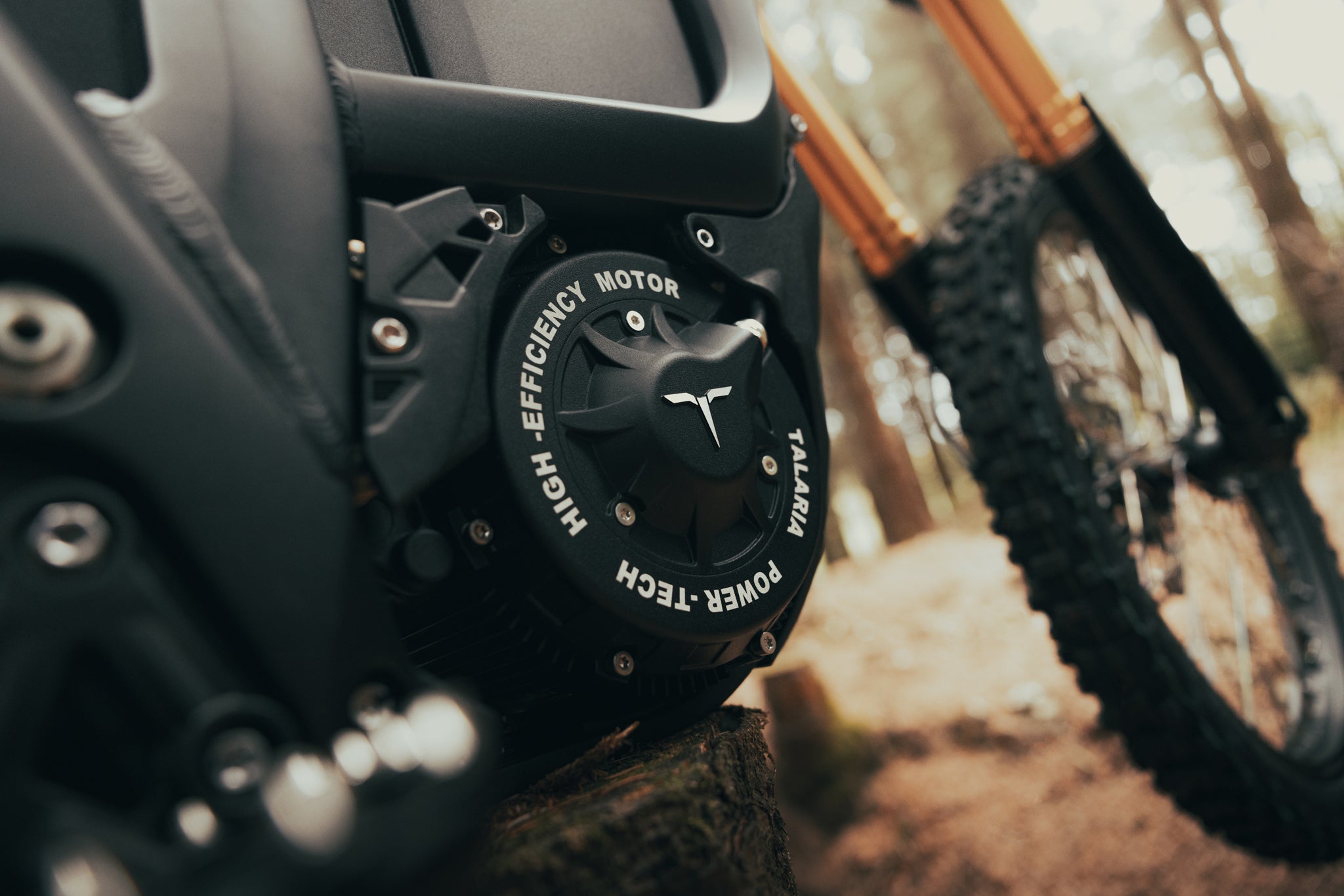 Close-up of a Komodo off road motorcycle engine with 'Power Tech' branding 