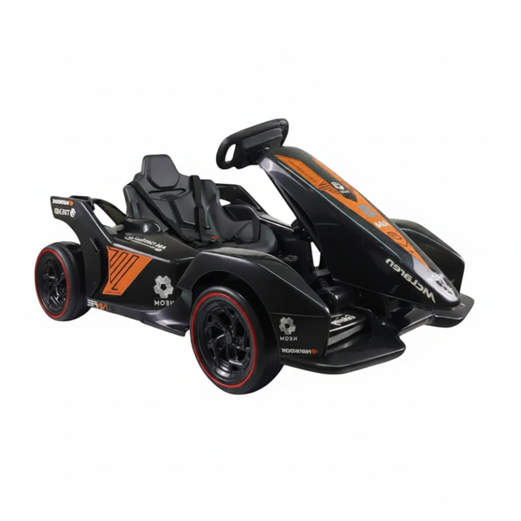 A black and orange Licensed McLaren 24 v toy go-kart with racing decals, including 'McLaren' branding, shown on a solid white background.