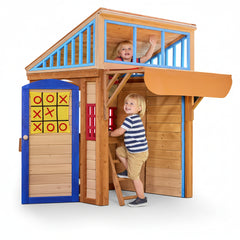 Wooden playhouse with a blue door featuring tic-tac-toe, red windows and kids doing role play activities