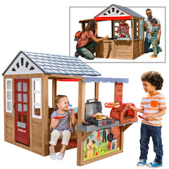 Children's playhouse with a grill and toys, featuring family activities